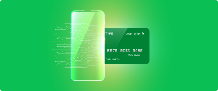 phone and credit card on green background